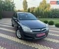 Серый Опель Астра, объемом двигателя 1.8 л и пробегом 187 тыс. км за 6999 $, фото 46 на Automoto.ua