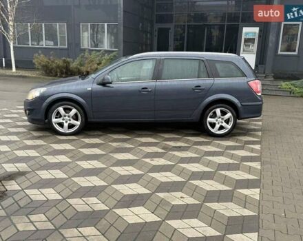 Серый Опель Астра, объемом двигателя 1.6 л и пробегом 175 тыс. км за 5650 $, фото 11 на Automoto.ua