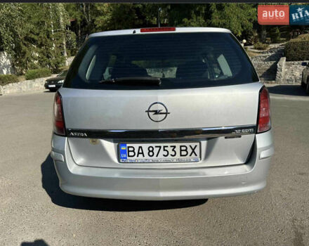 Серый Опель Астра, объемом двигателя 1.69 л и пробегом 217 тыс. км за 5850 $, фото 2 на Automoto.ua