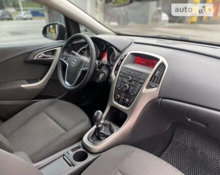 Серый Опель Астра, объемом двигателя 1.4 л и пробегом 230 тыс. км за 7000 $, фото 10 на Automoto.ua