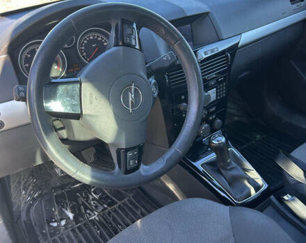 Серый Опель Астра, объемом двигателя 1.7 л и пробегом 295 тыс. км за 5500 $, фото 11 на Automoto.ua