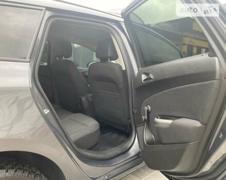 Серый Опель Астра, объемом двигателя 1.4 л и пробегом 230 тыс. км за 7000 $, фото 11 на Automoto.ua