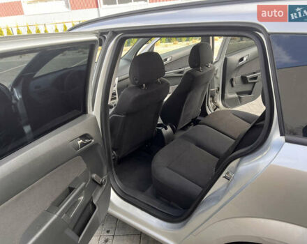 Серый Опель Астра, объемом двигателя 1.6 л и пробегом 231 тыс. км за 4950 $, фото 7 на Automoto.ua