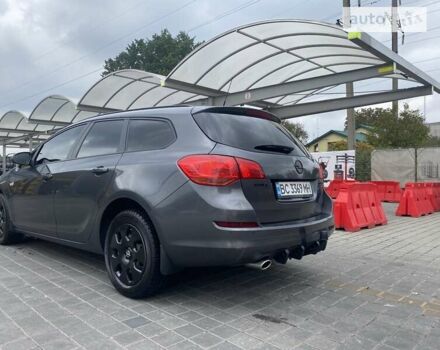 Серый Опель Астра, объемом двигателя 1.4 л и пробегом 230 тыс. км за 7000 $, фото 4 на Automoto.ua