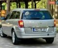 Серый Опель Астра, объемом двигателя 1.6 л и пробегом 149 тыс. км за 5999 $, фото 60 на Automoto.ua
