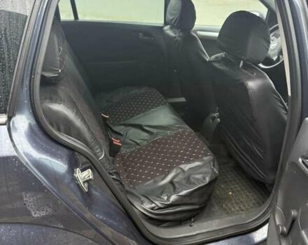 Серый Опель Астра, объемом двигателя 1.6 л и пробегом 175 тыс. км за 5650 $, фото 25 на Automoto.ua