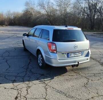 Серый Опель Астра, объемом двигателя 1.6 л и пробегом 260 тыс. км за 5000 $, фото 7 на Automoto.ua