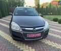 Серый Опель Астра, объемом двигателя 1.8 л и пробегом 187 тыс. км за 6999 $, фото 4 на Automoto.ua
