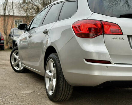 Серый Опель Астра, объемом двигателя 1.6 л и пробегом 148 тыс. км за 7800 $, фото 11 на Automoto.ua