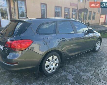 Серый Опель Астра, объемом двигателя 1.2 л и пробегом 294 тыс. км за 5900 $, фото 4 на Automoto.ua