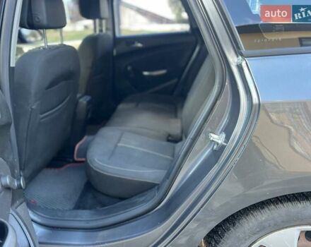 Серый Опель Астра, объемом двигателя 1.2 л и пробегом 294 тыс. км за 5900 $, фото 13 на Automoto.ua