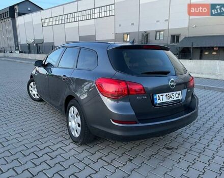 Сірий Опель Астра, об'ємом двигуна 1.7 л та пробігом 244 тис. км за 7000 $, фото 4 на Automoto.ua