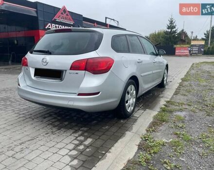 Серый Опель Астра, объемом двигателя 1.2 л и пробегом 289 тыс. км за 5800 $, фото 2 на Automoto.ua