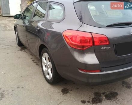 Серый Опель Астра, объемом двигателя 1.7 л и пробегом 204 тыс. км за 7600 $, фото 5 на Automoto.ua
