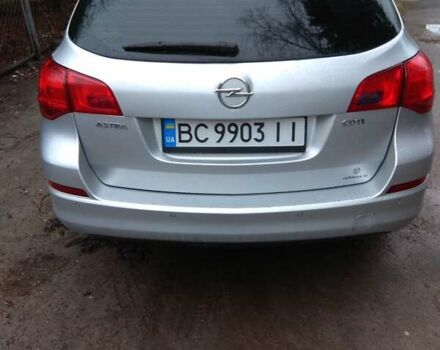 Серый Опель Астра, объемом двигателя 1.69 л и пробегом 248 тыс. км за 7200 $, фото 1 на Automoto.ua