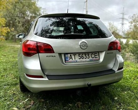 Серый Опель Астра, объемом двигателя 1.3 л и пробегом 370 тыс. км за 5900 $, фото 7 на Automoto.ua