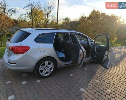 Серый Опель Астра, объемом двигателя 1.7 л и пробегом 309 тыс. км за 7000 $, фото 10 на Automoto.ua