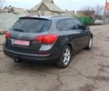 Серый Опель Астра, объемом двигателя 1.7 л и пробегом 185 тыс. км за 7600 $, фото 10 на Automoto.ua