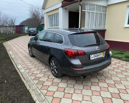 Серый Опель Астра, объемом двигателя 2 л и пробегом 245 тыс. км за 8850 $, фото 2 на Automoto.ua