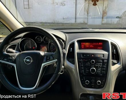 Серый Опель Астра, объемом двигателя 1.2 л и пробегом 282 тыс. км за 6050 $, фото 1 на Automoto.ua
