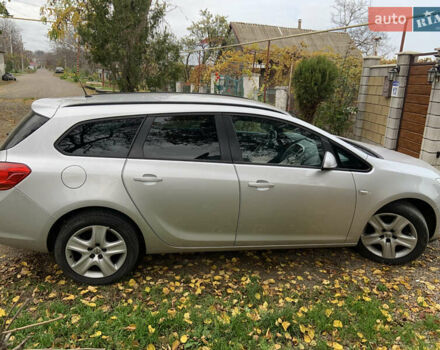 Серый Опель Астра, объемом двигателя 1.69 л и пробегом 230 тыс. км за 7600 $, фото 11 на Automoto.ua