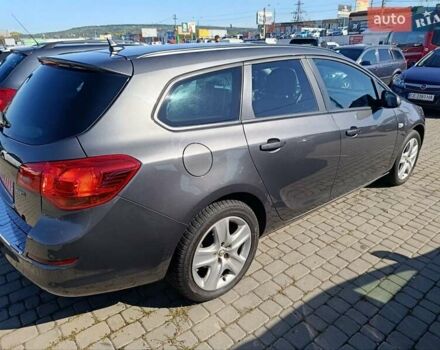 Серый Опель Астра, объемом двигателя 1.7 л и пробегом 196 тыс. км за 7100 $, фото 8 на Automoto.ua