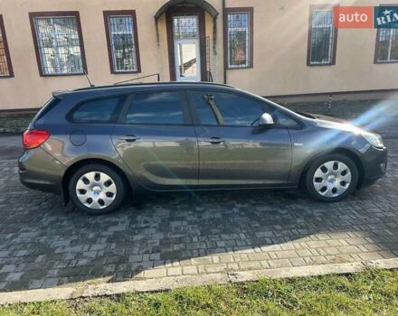 Серый Опель Астра, объемом двигателя 1.2 л и пробегом 294 тыс. км за 5900 $, фото 12 на Automoto.ua