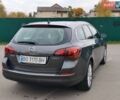 Сірий Опель Астра, об'ємом двигуна 1.4 л та пробігом 228 тис. км за 6850 $, фото 7 на Automoto.ua