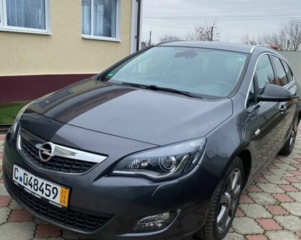 Серый Опель Астра, объемом двигателя 2 л и пробегом 245 тыс. км за 8850 $, фото 4 на Automoto.ua