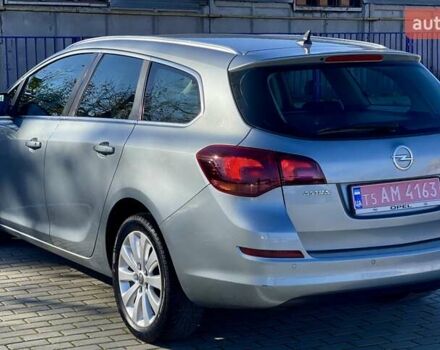 Серый Опель Астра, объемом двигателя 1.7 л и пробегом 259 тыс. км за 7700 $, фото 17 на Automoto.ua