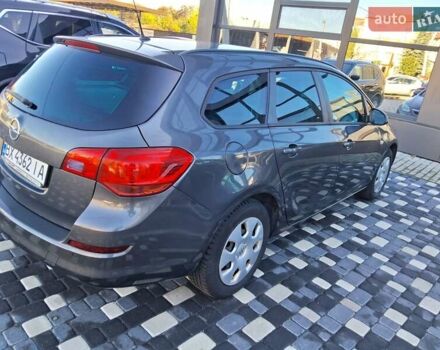 Серый Опель Астра, объемом двигателя 1.6 л и пробегом 176 тыс. км за 7200 $, фото 4 на Automoto.ua