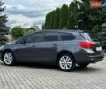 Сірий Опель Астра, об'ємом двигуна 2 л та пробігом 249 тис. км за 7299 $, фото 4 на Automoto.ua