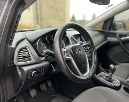 Серый Опель Астра, объемом двигателя 1.2 л и пробегом 264 тыс. км за 4750 $, фото 11 на Automoto.ua