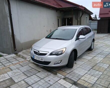 Серый Опель Астра, объемом двигателя 1.7 л и пробегом 266 тыс. км за 7500 $, фото 7 на Automoto.ua