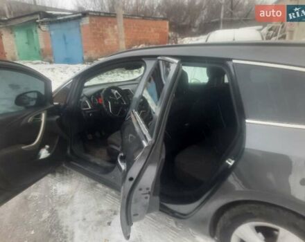 Серый Опель Астра, объемом двигателя 1.2 л и пробегом 275 тыс. км за 5000 $, фото 2 на Automoto.ua