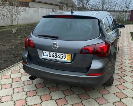 Серый Опель Астра, объемом двигателя 2 л и пробегом 245 тыс. км за 8850 $, фото 3 на Automoto.ua