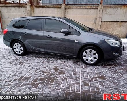 Сірий Опель Астра, об'ємом двигуна 1.2 л та пробігом 220 тис. км за 5999 $, фото 2 на Automoto.ua