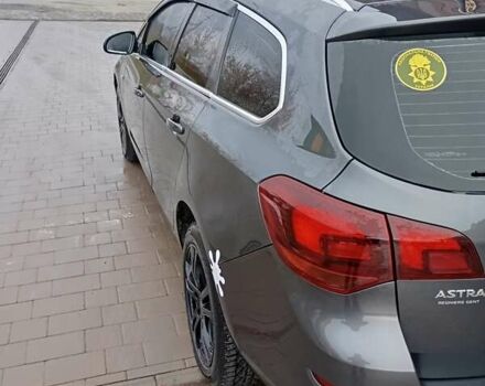 Серый Опель Астра, объемом двигателя 1.7 л и пробегом 236 тыс. км за 7200 $, фото 8 на Automoto.ua