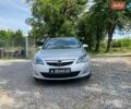 Серый Опель Астра, объемом двигателя 2 л и пробегом 265 тыс. км за 6999 $, фото 6 на Automoto.ua