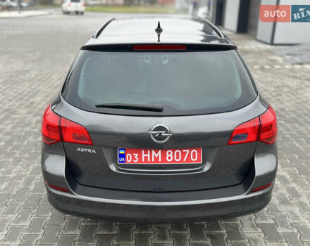 Серый Опель Астра, объемом двигателя 1.6 л и пробегом 142 тыс. км за 8000 $, фото 26 на Automoto.ua