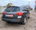 Серый Опель Астра, объемом двигателя 1.7 л и пробегом 185 тыс. км за 7500 $, фото 6 на Automoto.ua