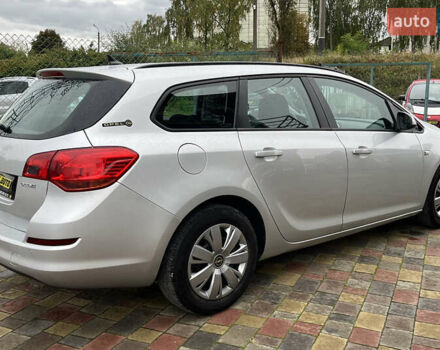 Серый Опель Астра, объемом двигателя 1.25 л и пробегом 238 тыс. км за 5499 $, фото 6 на Automoto.ua