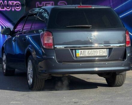 Серый Опель Астра, объемом двигателя 1.6 л и пробегом 147 тыс. км за 6799 $, фото 4 на Automoto.ua