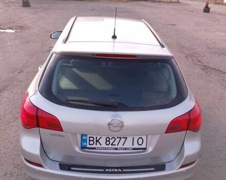 Серый Опель Астра, объемом двигателя 1.4 л и пробегом 183 тыс. км за 5700 $, фото 3 на Automoto.ua