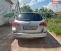 Серый Опель Астра, объемом двигателя 1.3 л и пробегом 288 тыс. км за 5600 $, фото 8 на Automoto.ua