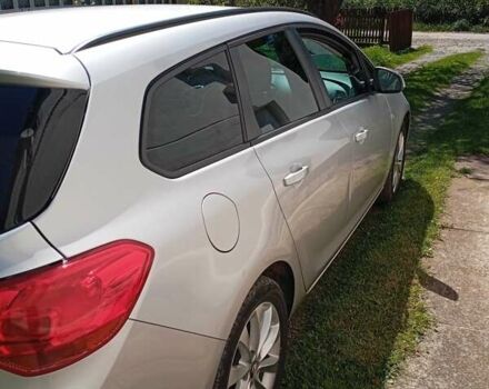 Серый Опель Астра, объемом двигателя 1.7 л и пробегом 210 тыс. км за 7000 $, фото 4 на Automoto.ua