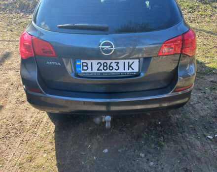 Серый Опель Астра, объемом двигателя 1.6 л и пробегом 140 тыс. км за 8400 $, фото 6 на Automoto.ua