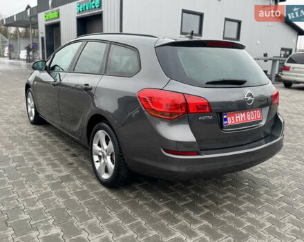 Серый Опель Астра, объемом двигателя 1.6 л и пробегом 142 тыс. км за 8000 $, фото 23 на Automoto.ua