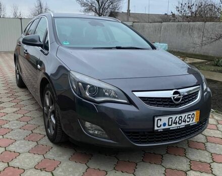 Серый Опель Астра, объемом двигателя 2 л и пробегом 245 тыс. км за 8850 $, фото 5 на Automoto.ua