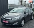 Серый Опель Астра, объемом двигателя 1.4 л и пробегом 199 тыс. км за 7000 $, фото 3 на Automoto.ua